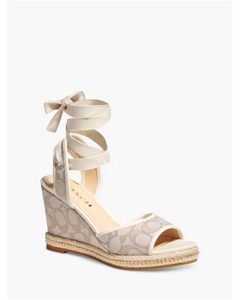 signature coach wedge sandals.